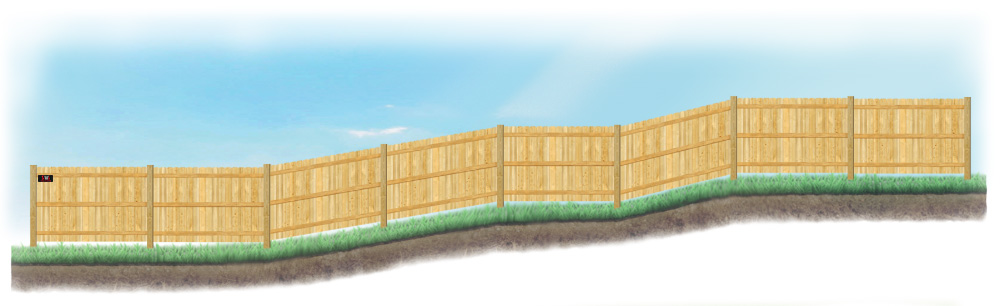 A stepped fence on sloped ground in Casper Wyoming